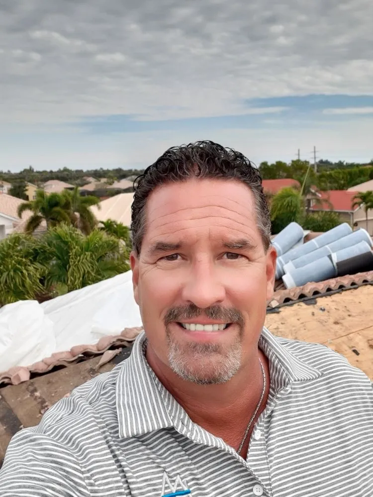 Slide of Lifetime Metal and Tile Roofing