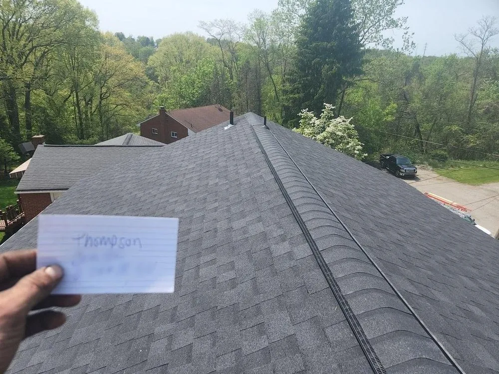 Slide of Lifetime Quality Roofing