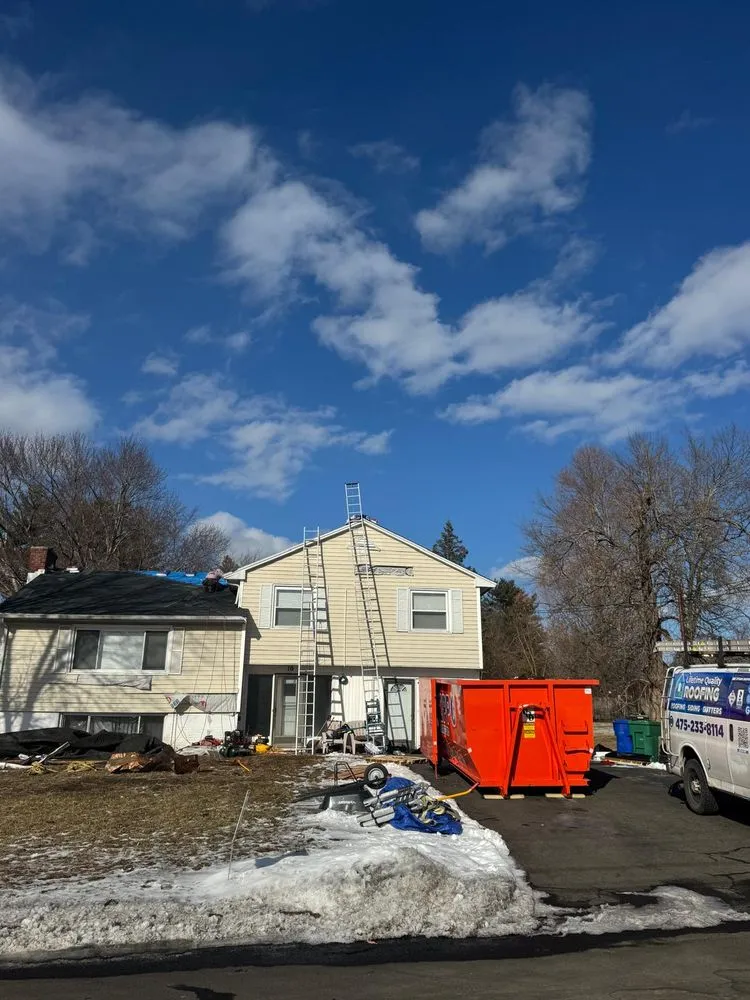 Slide of Lifetime Quality Roofing