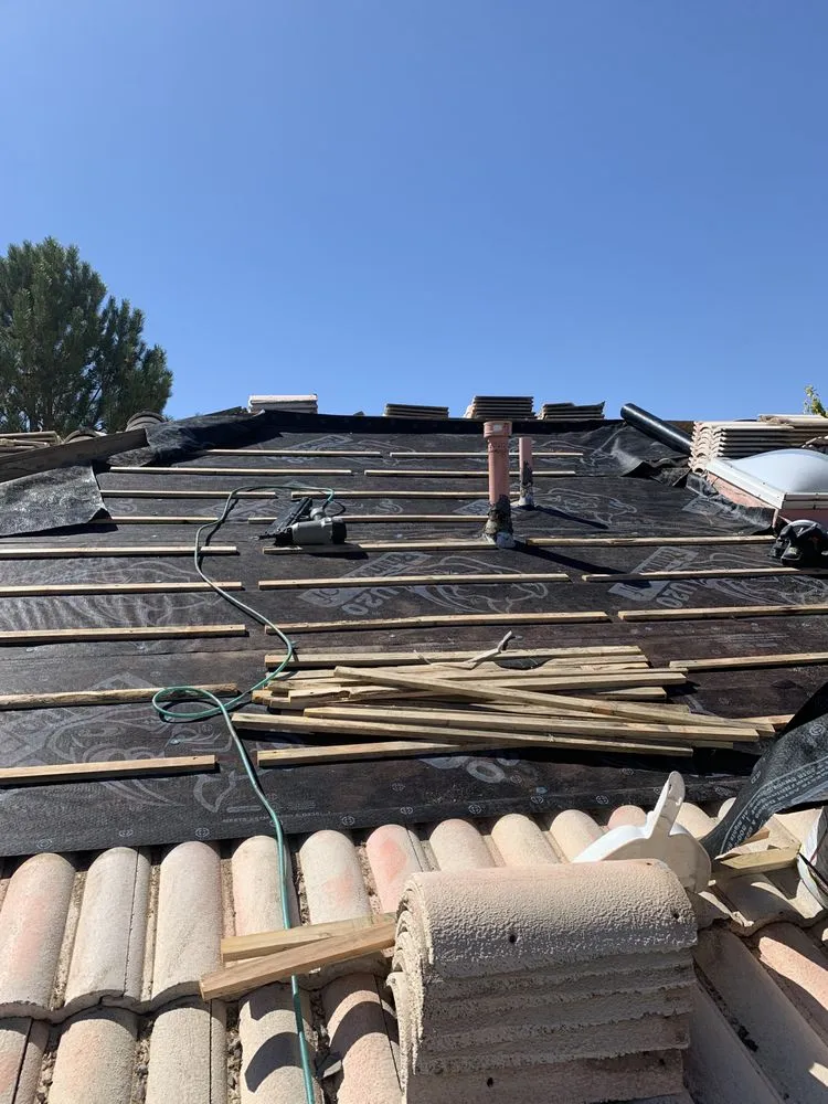 Slide of Lifetime Roof and Stucco