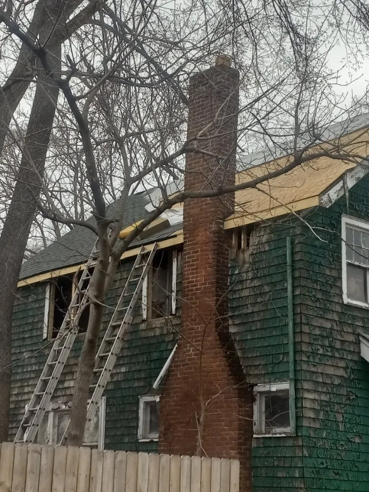 Slide of Lighthouse Roofing