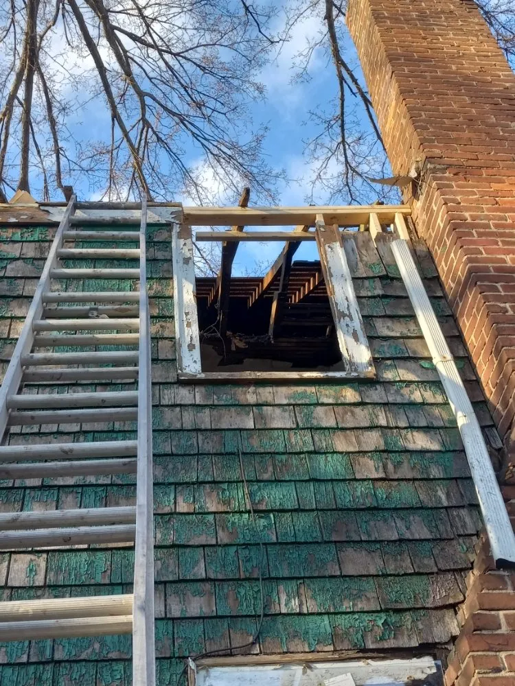 Slide of Lighthouse Roofing