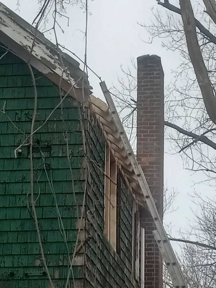Slide of Lighthouse Roofing