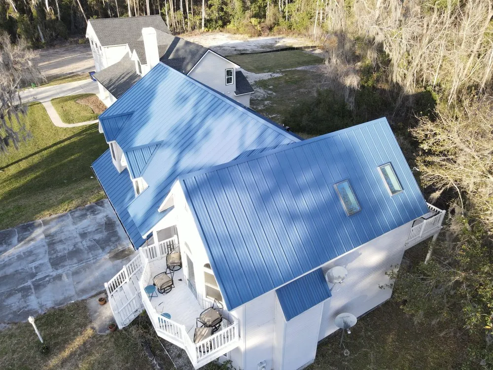 Local flat roof repair after storm damage in St. Augustine, FL by Lighthouse Roofing