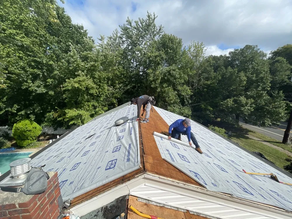 Slide of Lincoln Roofing