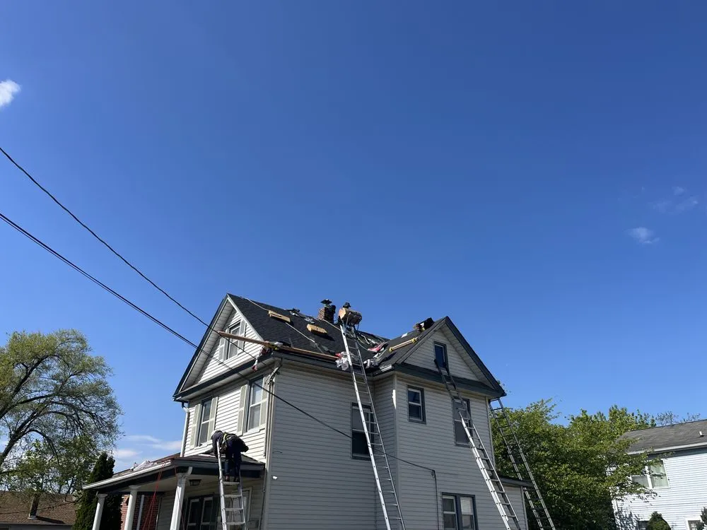 Slide of Lincoln Roofing