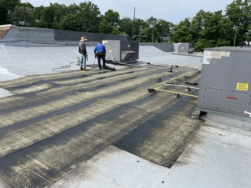 Slide of Lincoln Roofing