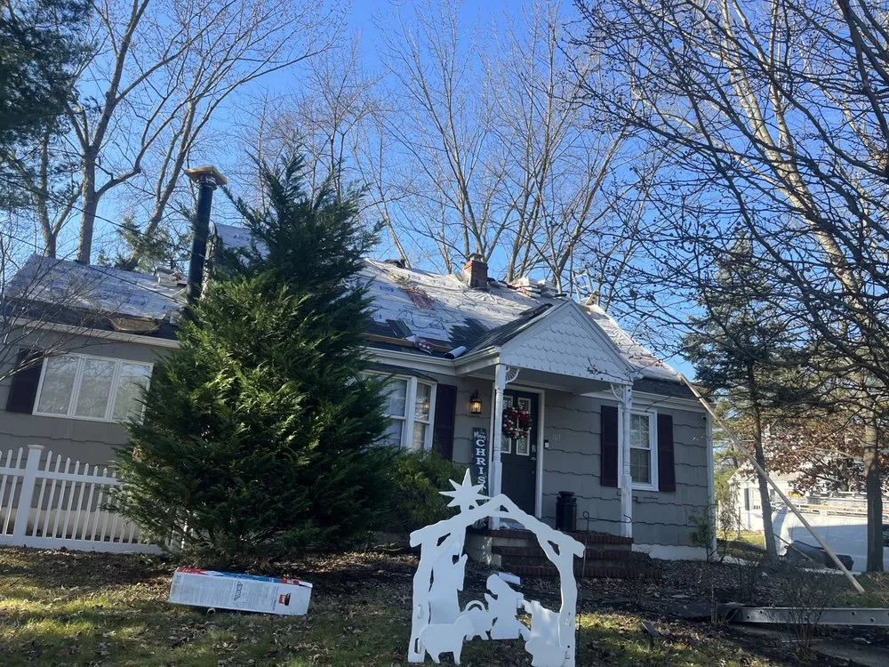 Slide of Lincoln Roofing
