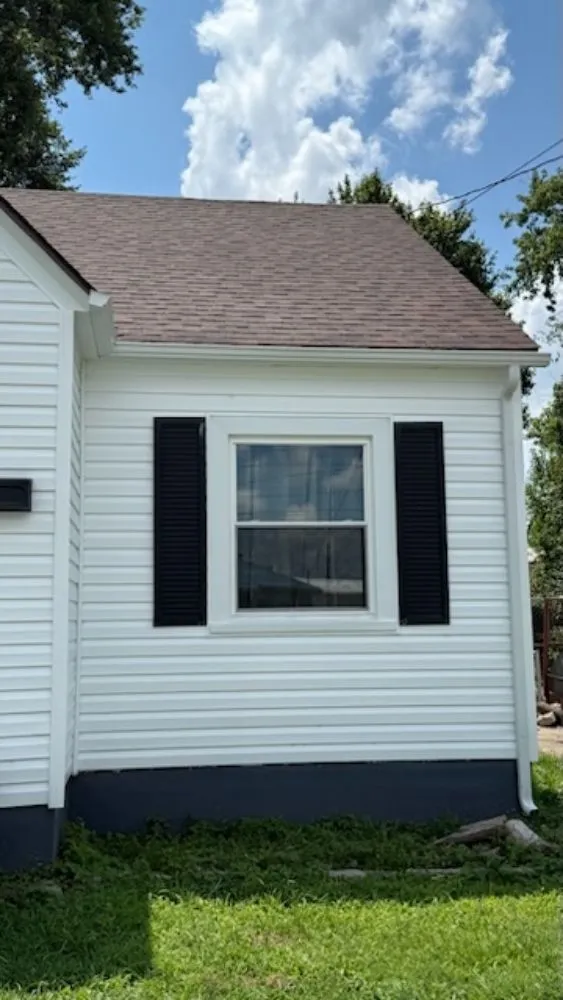 Slide of Lincoln Roofing