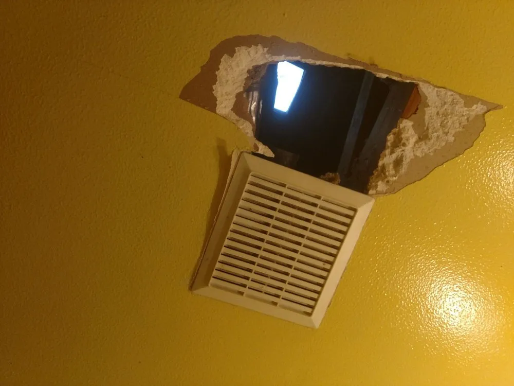 Slide of Lindy Roofing