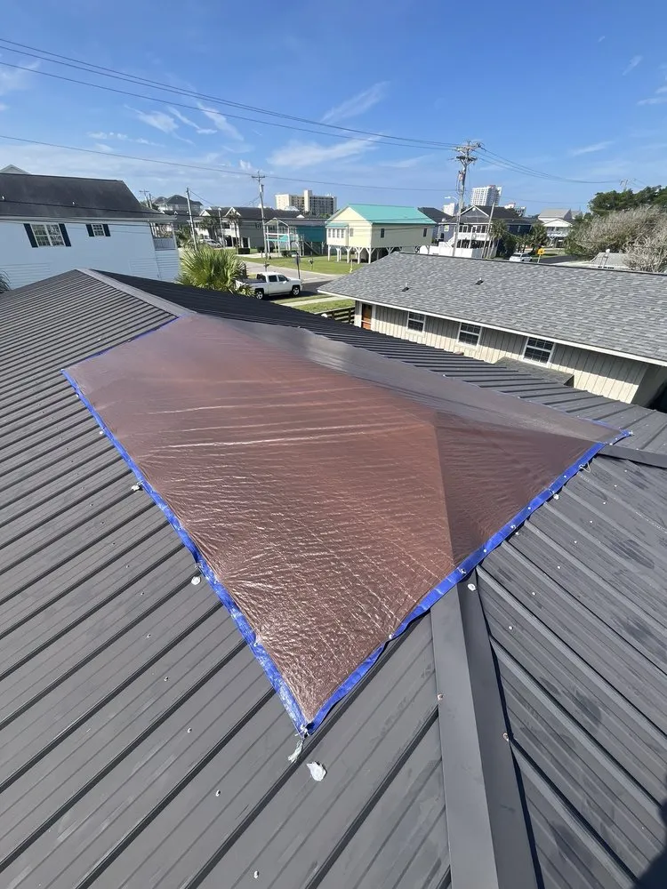 Slide of Linta Roofing