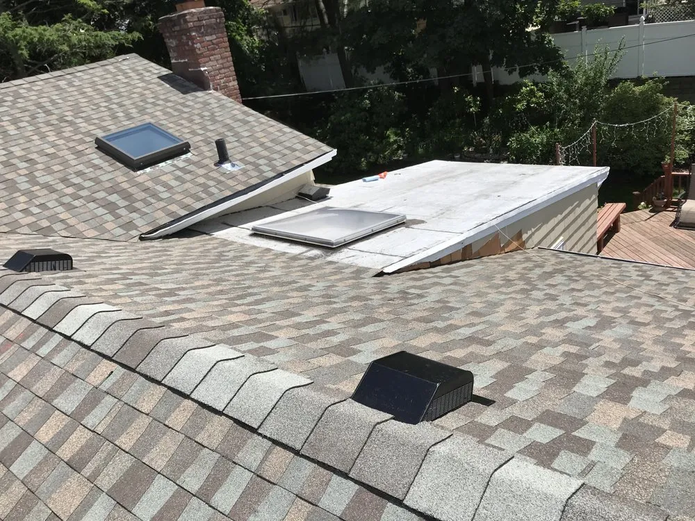 Slide of L.I.N.Y. Roofing