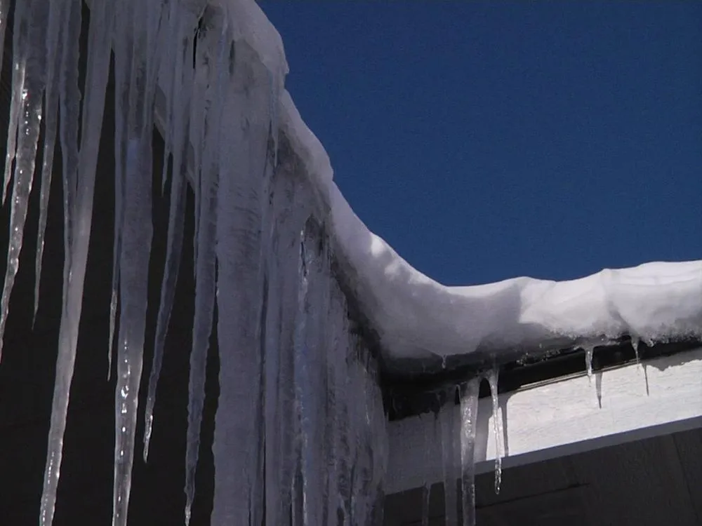 Slide of Lion Roofing & Gutters