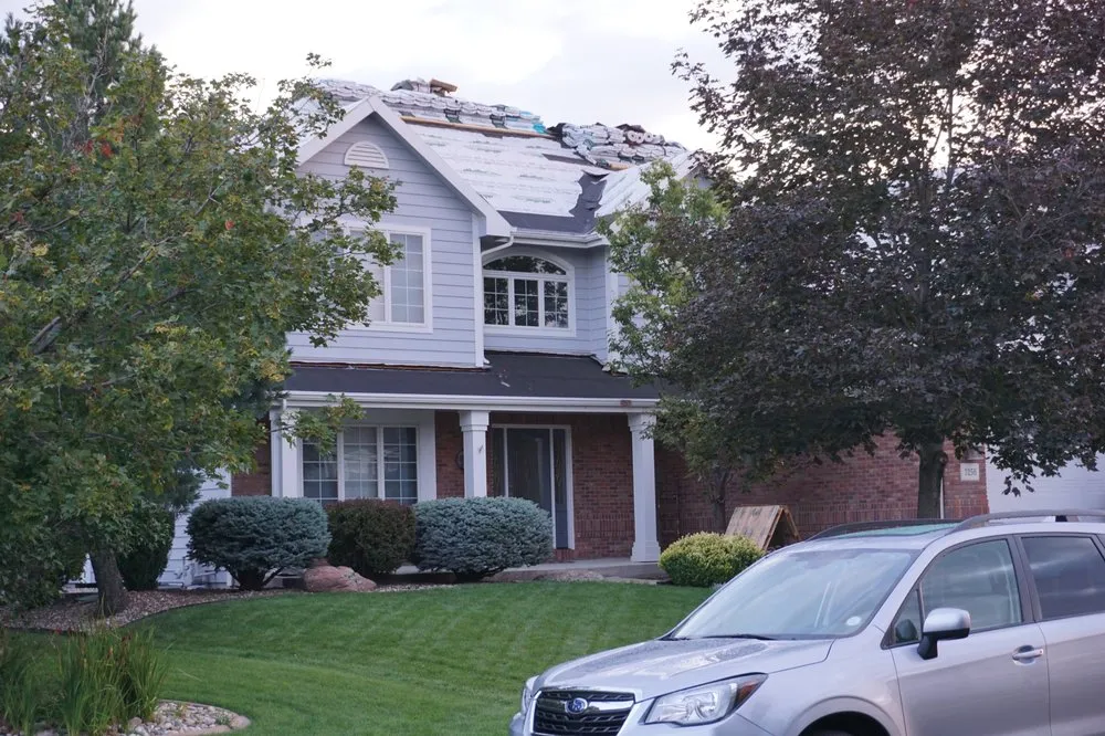 Slide of Lion Roofing & Gutters