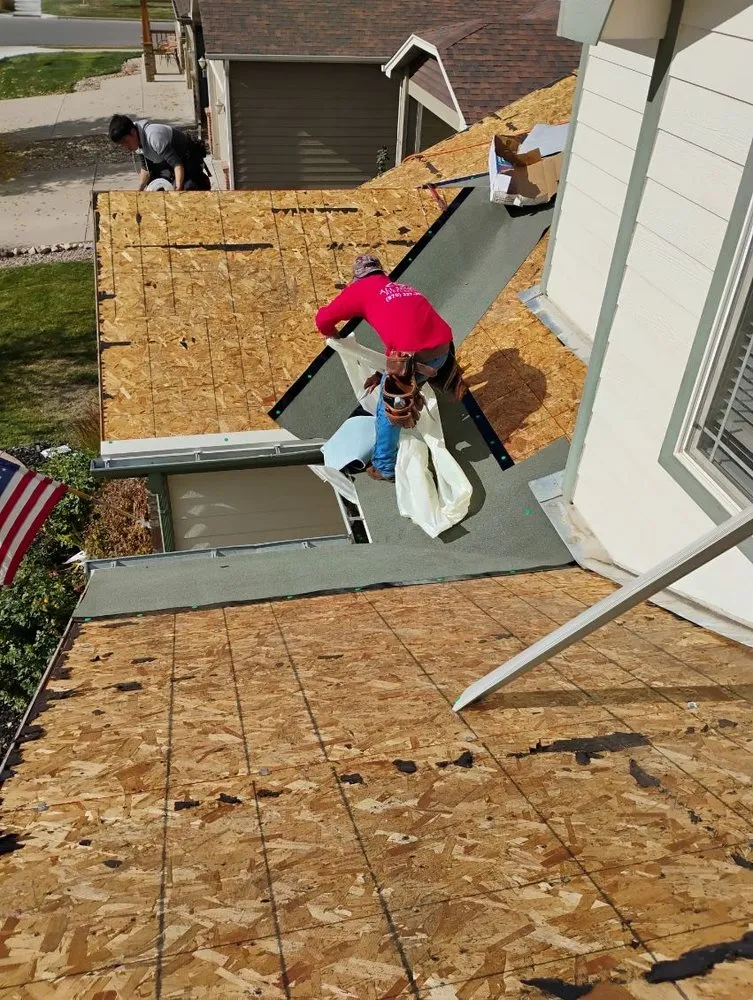 Slide of Lion Roofing & Gutters