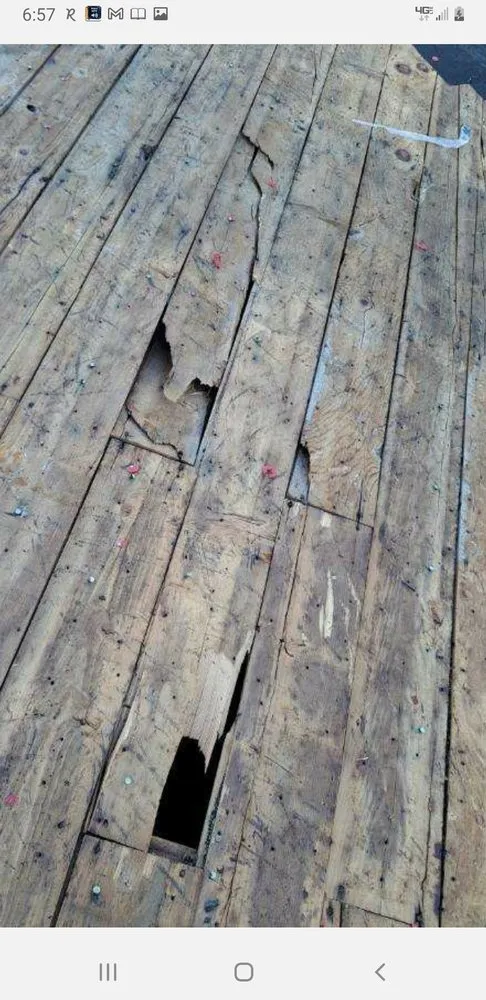 Slide of Lion Roofing Remodeling Company