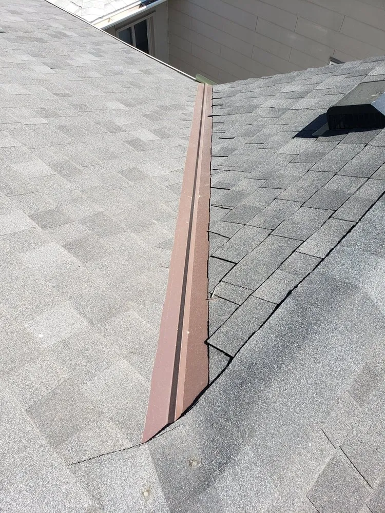 Slide of Lion Roofing Remodeling Company