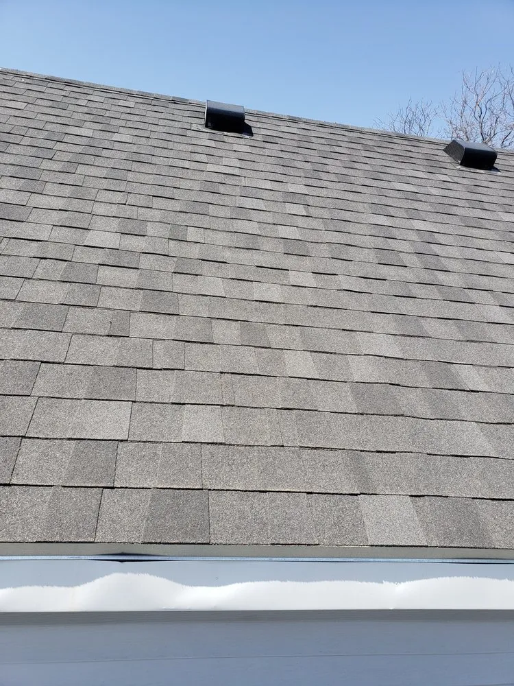 Slide of Lion Roofing Remodeling Company