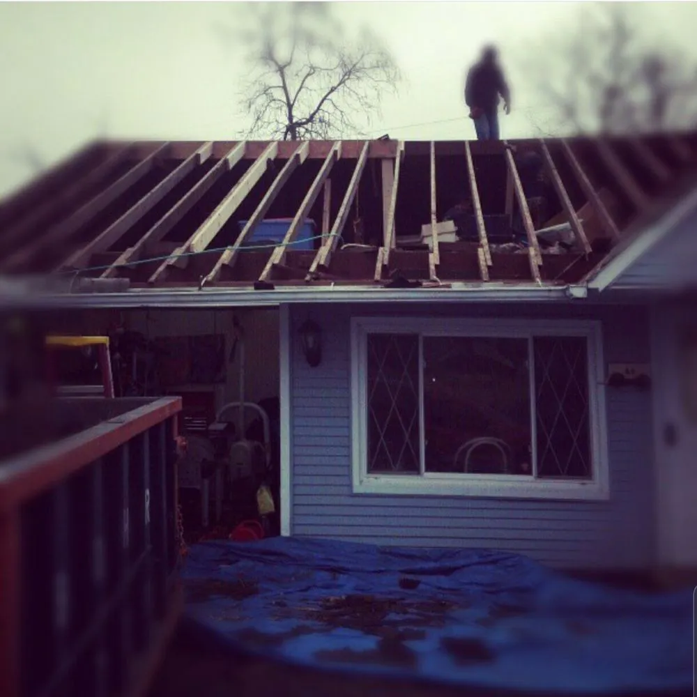 Slide of Lions Roofing