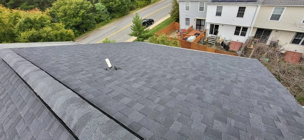 Slide of Lions Roofing Construction