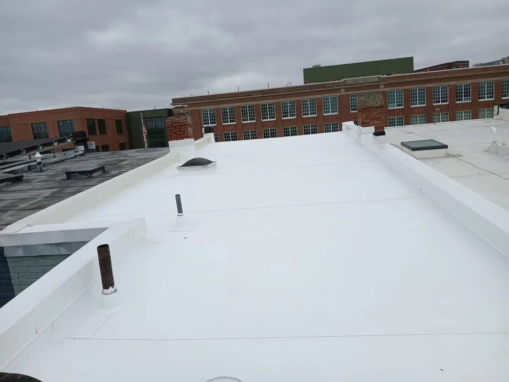 Slide of Lions Roofing Construction