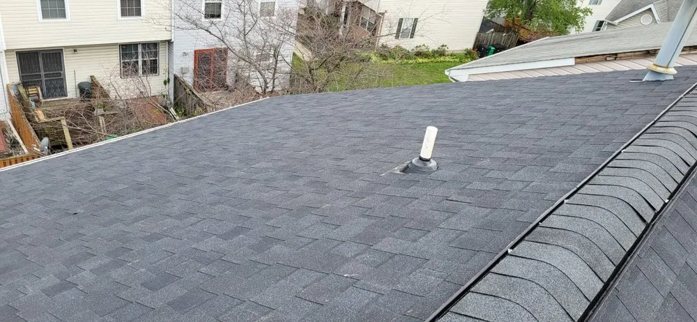 Slide of Lions Roofing Construction