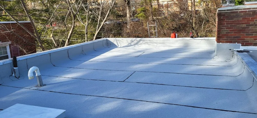 Slide of Lions Roofing Construction