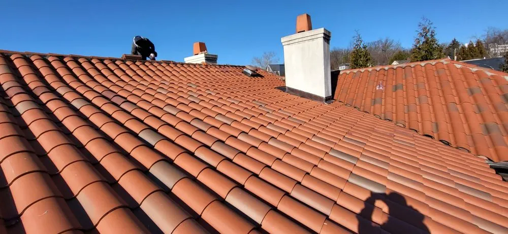 Slide of Lions Roofing Construction