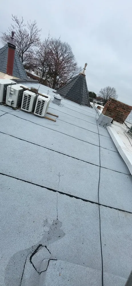 Slide of Lions Roofing Construction