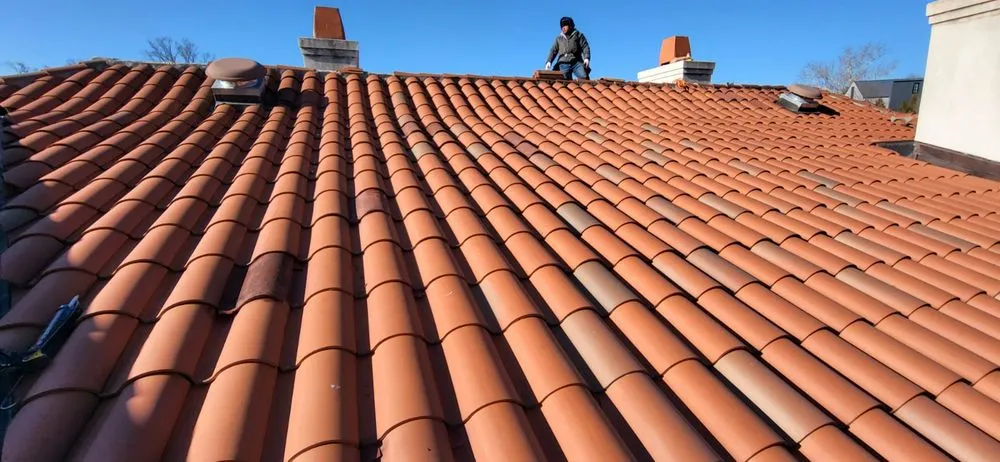 Slide of Lions Roofing Construction