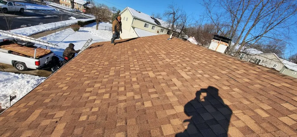 Slide of Lions Roofing Construction