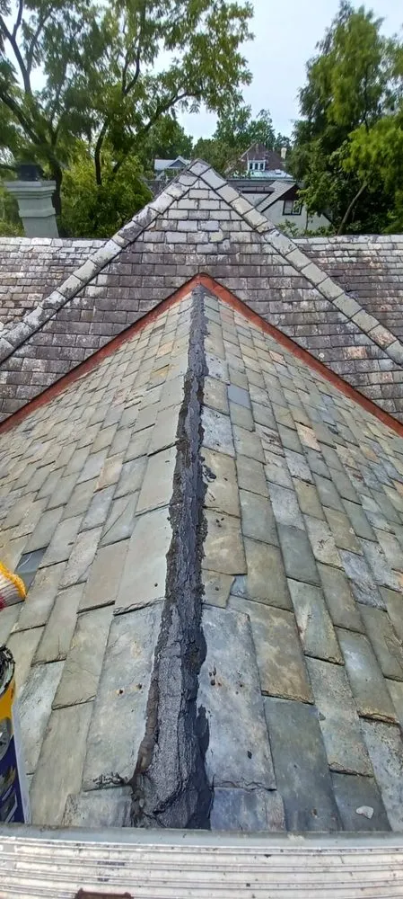 Slide of Lions Roofing Construction