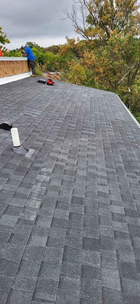 Slide of Lions Roofing Construction