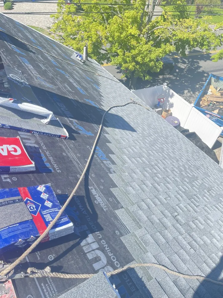 Slide of LionShield Roofing Company