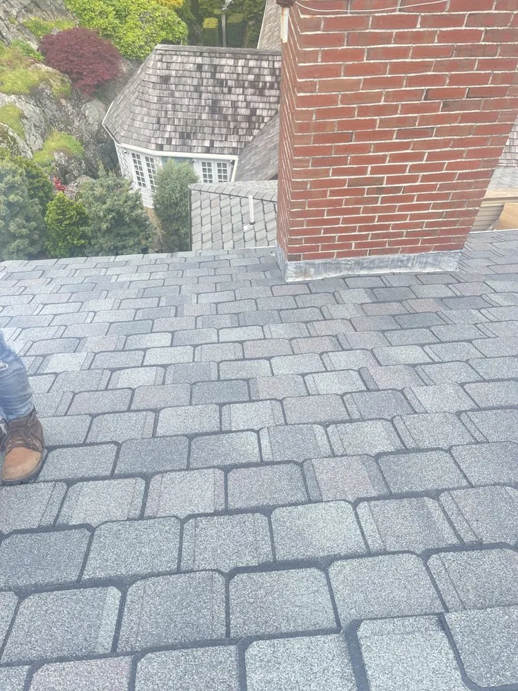 Slide of LionShield Roofing Company