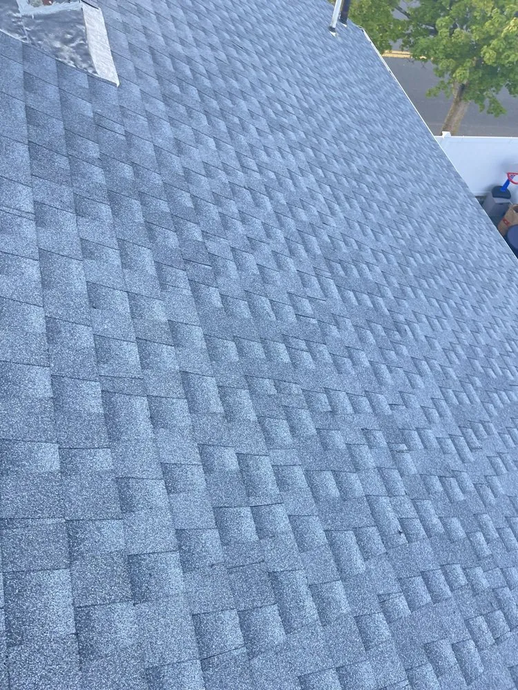 Slide of LionShield Roofing Company