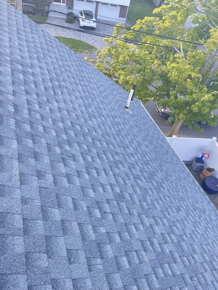 Slide of LionShield Roofing Company