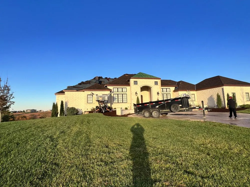 Slide of Little Apple Roofing