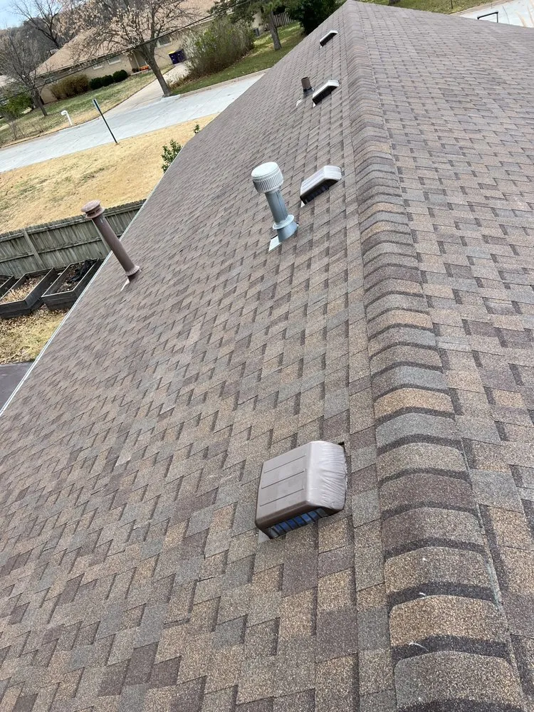 Slide of Little Apple Roofing