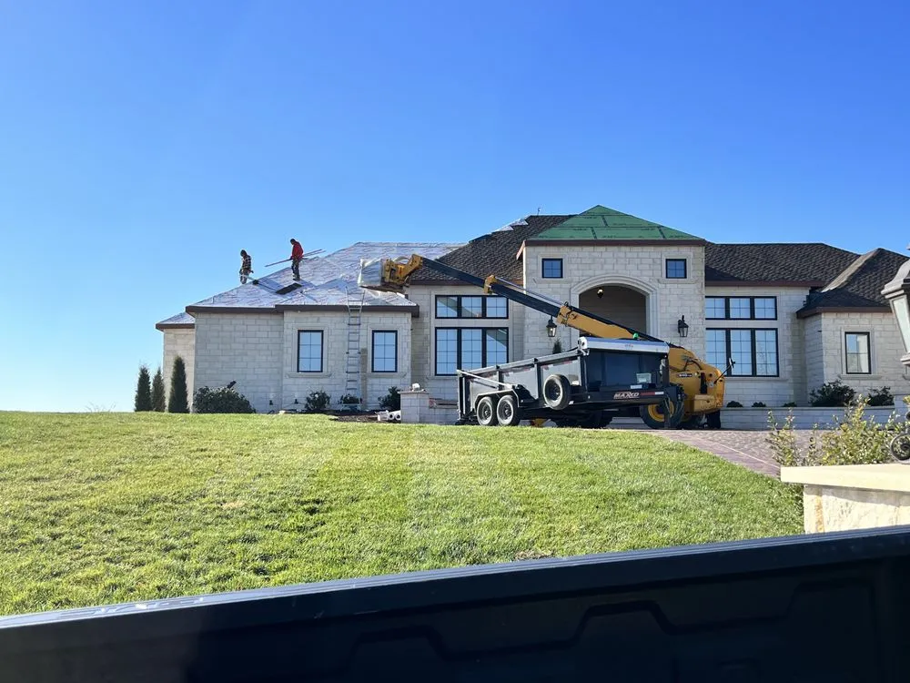 Slide of Little Apple Roofing