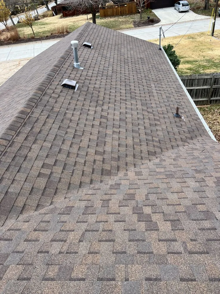 Slide of Little Apple Roofing