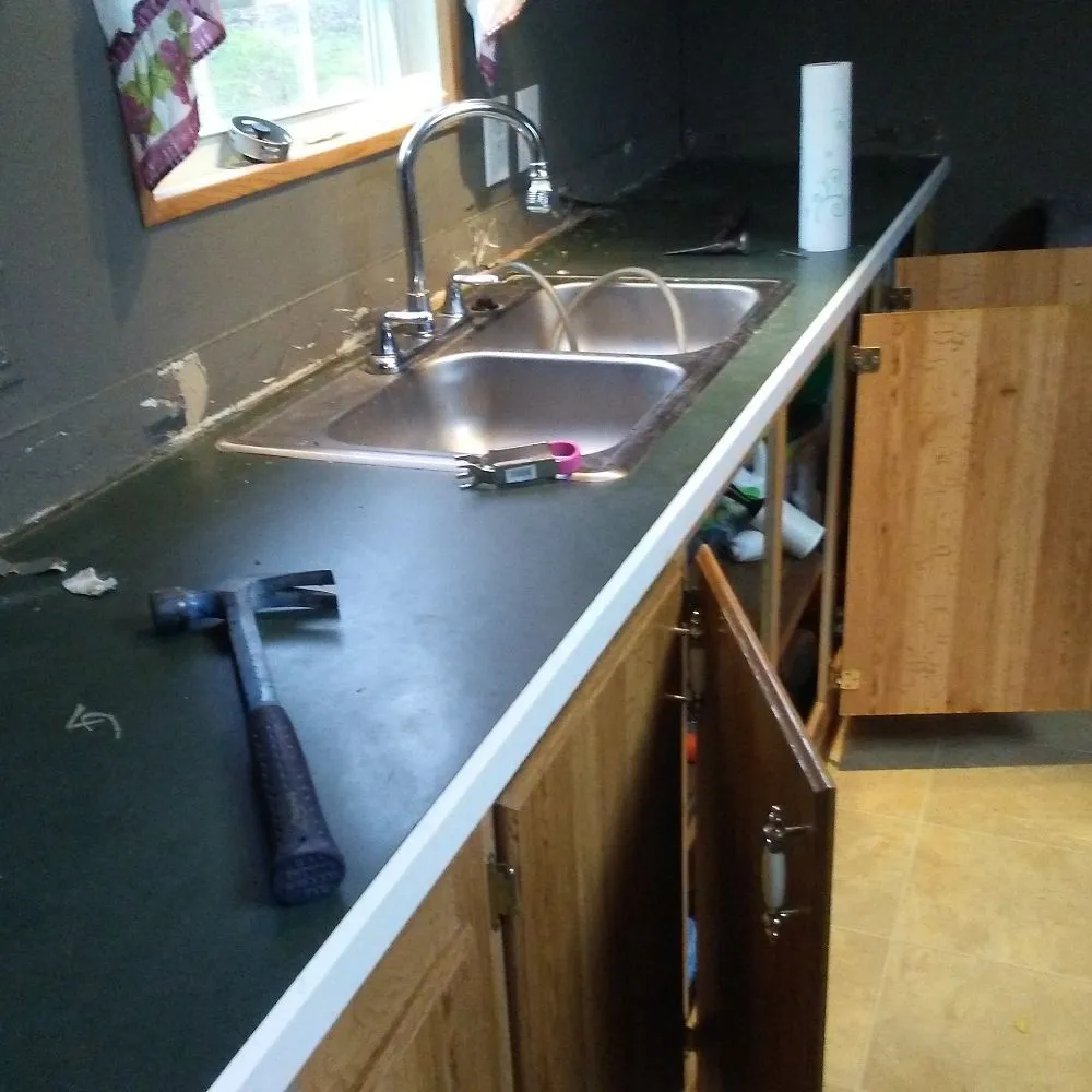 Slide of Little Ds Home Improvements