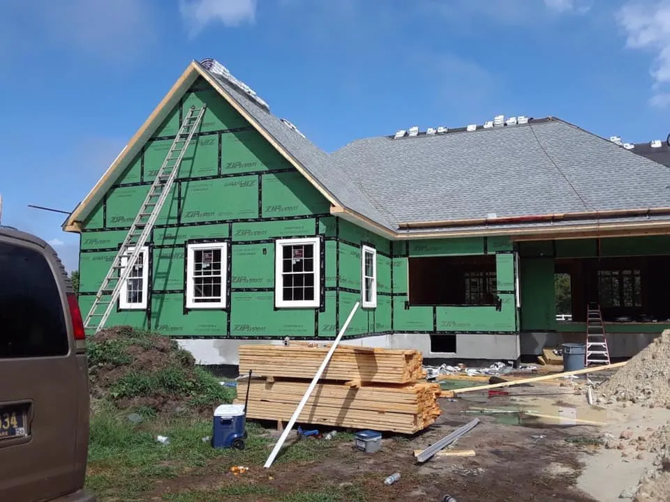 Slide of Little Tiger Roofing