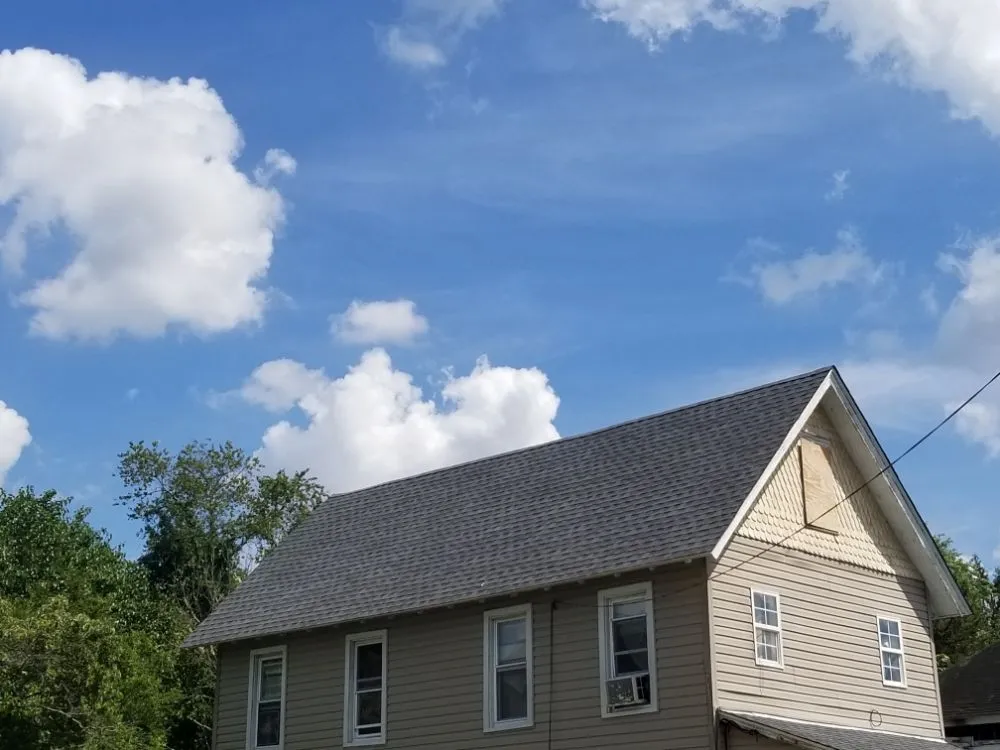 Slide of Little Tiger Roofing