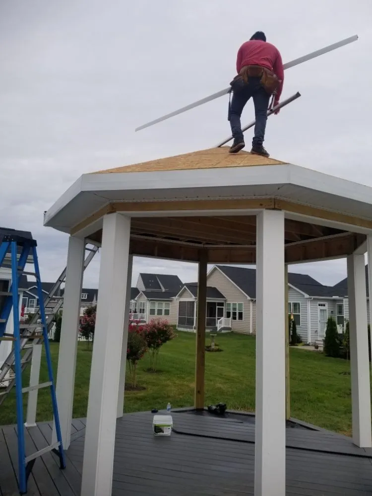 Slide of Little Tiger Roofing