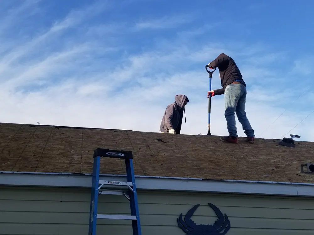 Slide of Little Tiger Roofing
