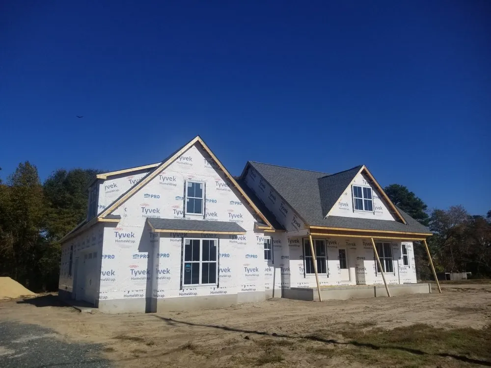 Slide of Little Tiger Roofing