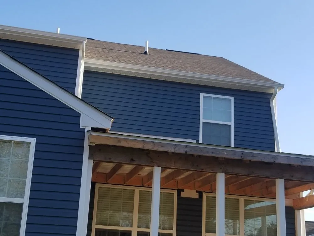 Slide of Little Tiger Roofing