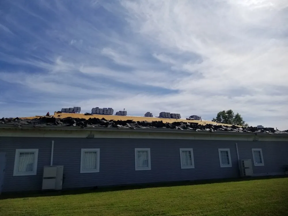 Slide of Little Tiger Roofing