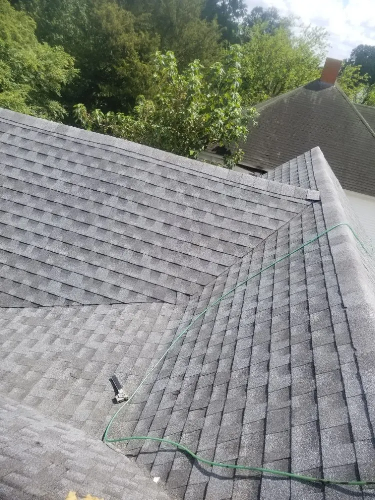 Slide of Little Tiger Roofing